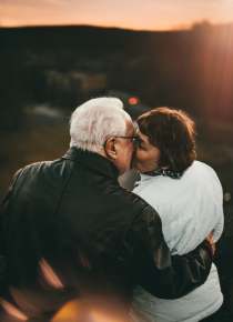 older couple kissing